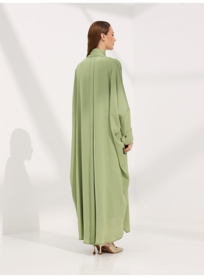 Khan&Co. Seven Seas Matcha matcha green crepe fabric abaya with two gold KHAN&CO logo buttons - by Abdullah Khan - Image 4