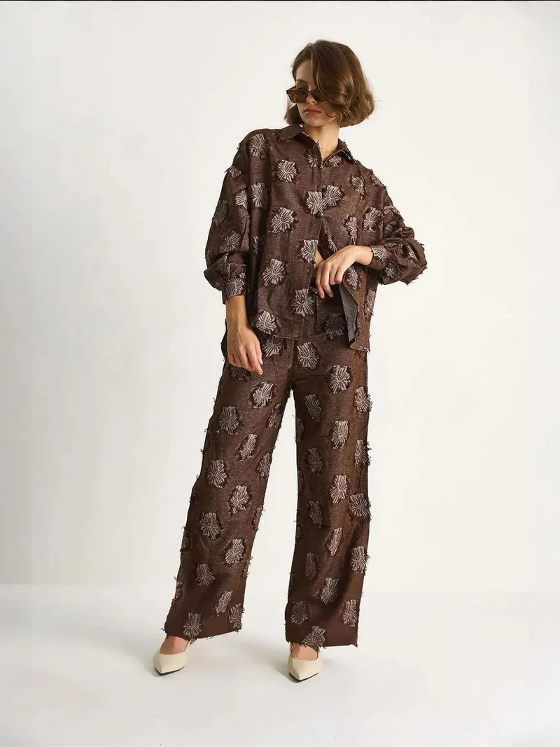 بيانكو لوتشي طقم قميص واسع مطرز وسروال واسع الساق من لوكسي