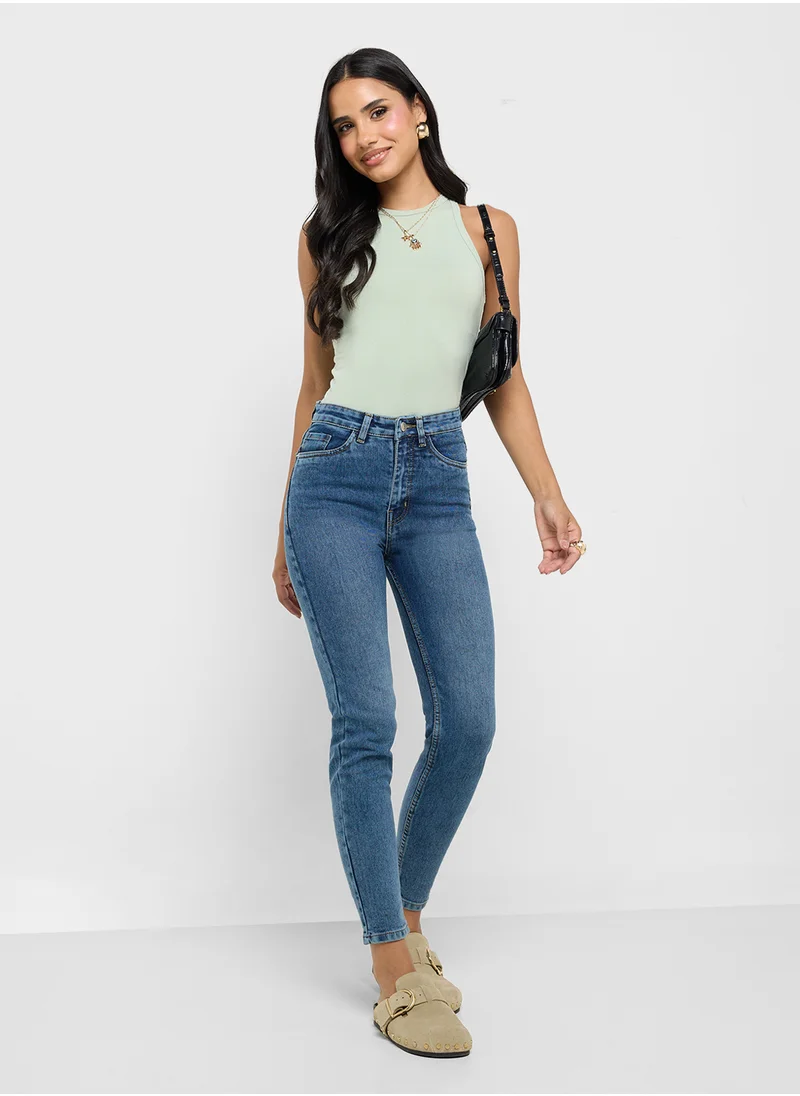 جينجر High Rise Skinny Jeans
