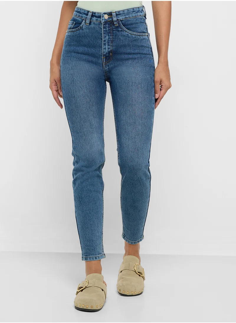جينجر High Rise Skinny Jeans