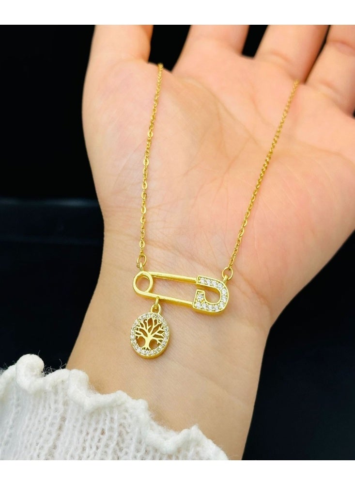 World Luxury Elegant gold necklace with a safety pin design and an inlaid tree of life. - Image 2