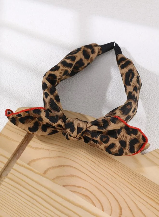 تايك تو طوق رأس بفيونكة بطبعة نمر