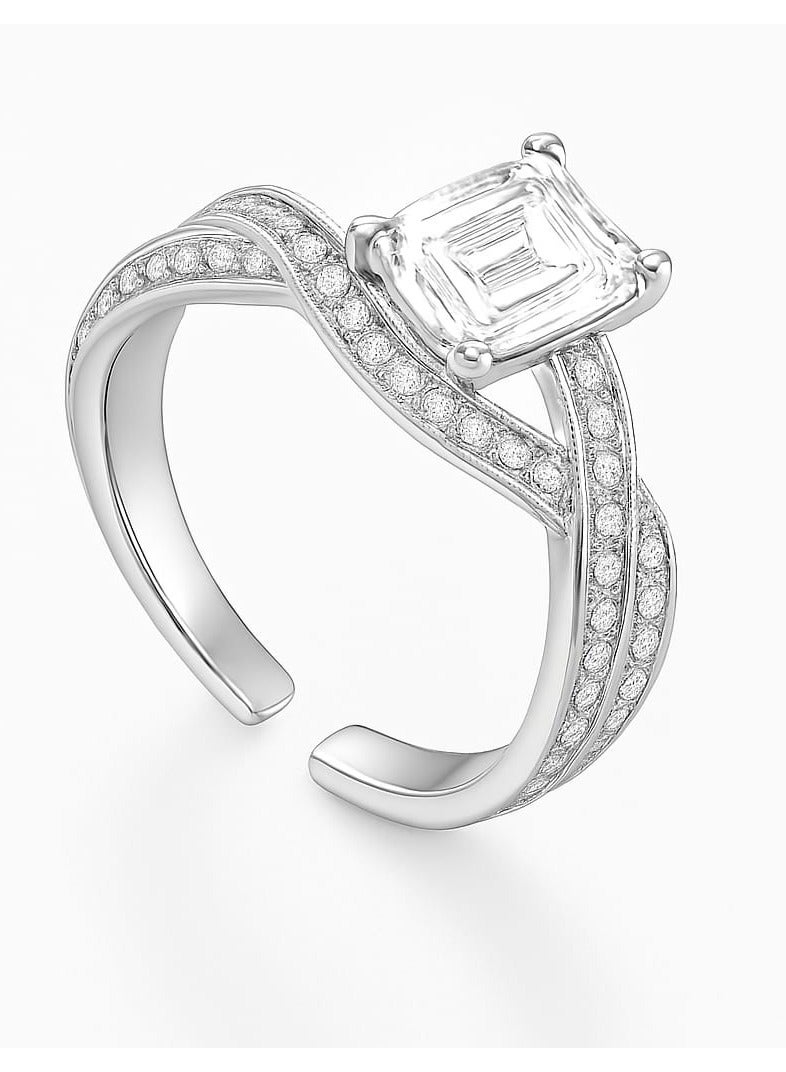 ""Aura of Luxury"" Ring - An Eye-Catching Design Shine an unforgettable look with this luxurious ring, which combines boldness and sophistication. A square-cut center stone sits atop an elegant base, surrounded by intricate details on the band, studded with tiny stones that add a subtle sparkle. Its distinctive design offers the perfect balance between luxury and modernity, making it a standout piece for every occasion." - Image 1