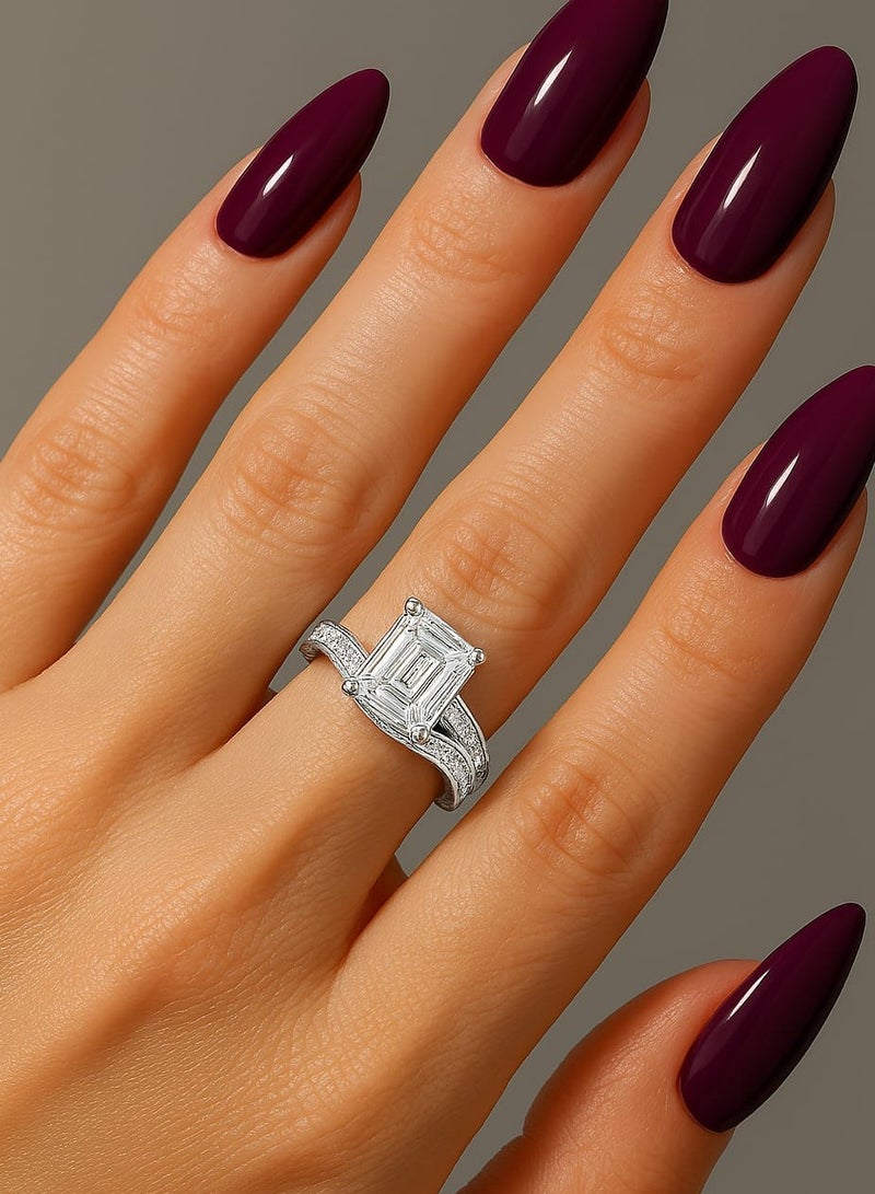 ""Aura of Luxury"" Ring - An Eye-Catching Design Shine an unforgettable look with this luxurious ring, which combines boldness and sophistication. A square-cut center stone sits atop an elegant base, surrounded by intricate details on the band, studded with tiny stones that add a subtle sparkle. Its distinctive design offers the perfect balance between luxury and modernity, making it a standout piece for every occasion." - Image 3