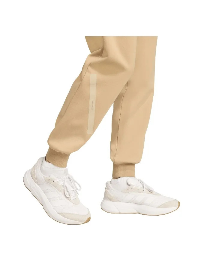Adidas beige Z.N.E. Tracksuit Bottoms for Women | Best Price UAE