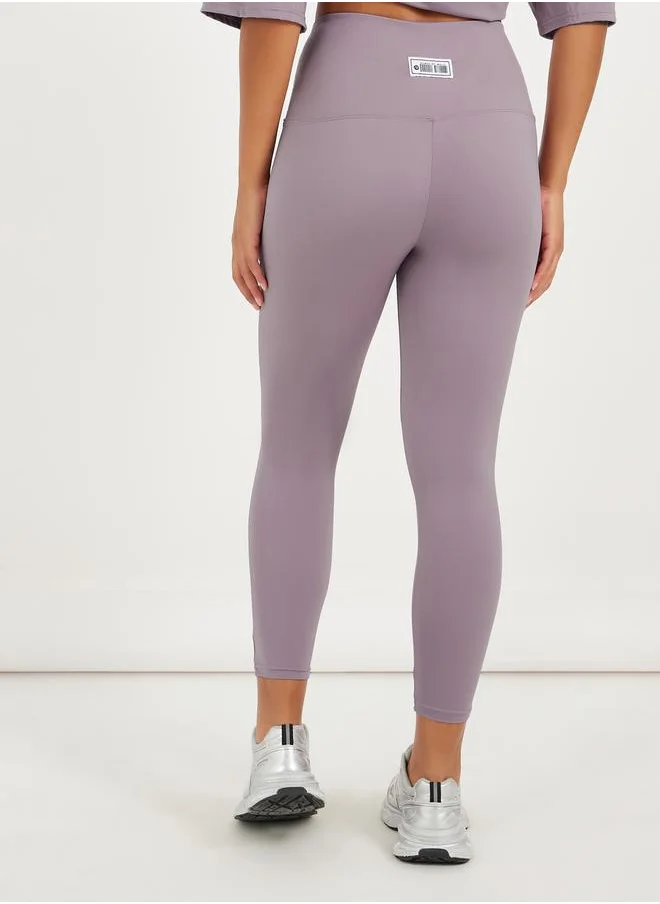 ستايلي Gymspire Edition - Label Ruched Waist 7/8 Leggings