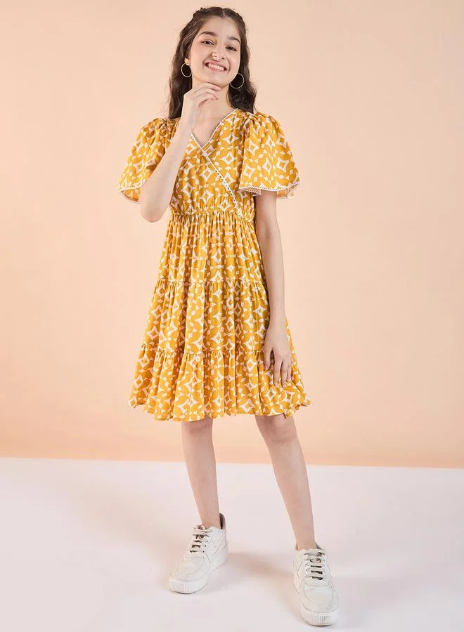 Stylo Bug Girls Yellow Printed Tiered Dress