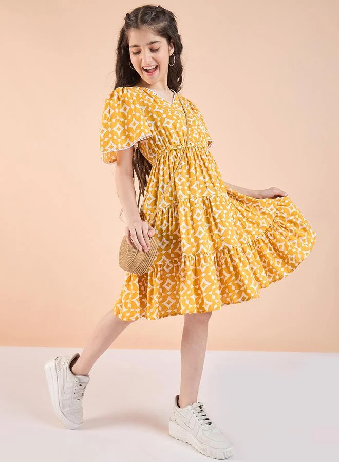 Stylo Bug Girls Yellow Printed Tiered Dress