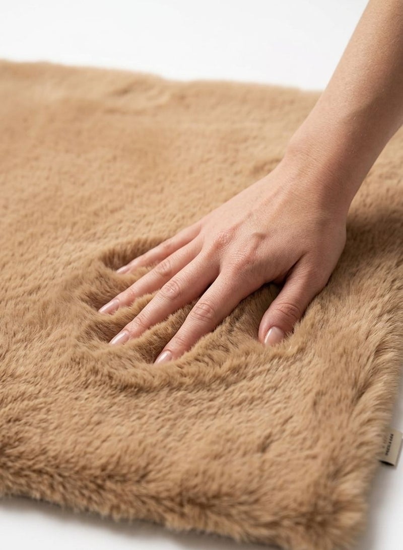 High‑quality fur small rug with a luxurious soft feel Made from ultra‑plush fibers for maximum comfort Non‑slip backing keeps the rug firmly in place Anti‑allergic material safe for sensitive skin Durable construction that stays fluffy and elegant Perfect for bedrooms, living rooms, and cozy corners - Image 1