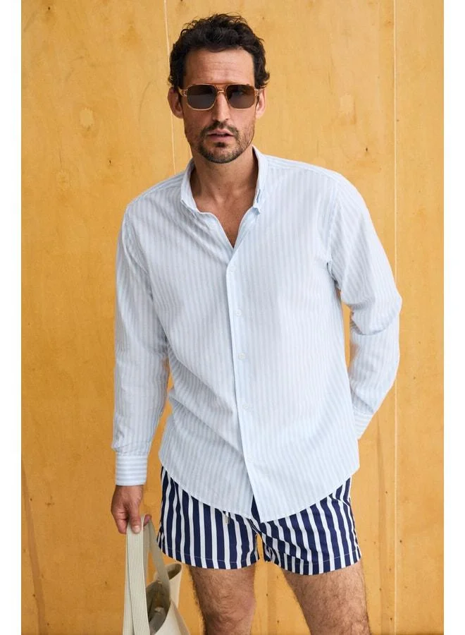 Grimelange RISTO Men's button-down shirt with collar and cuff, blue striped fabric that minimizes ironing needs after washing.
