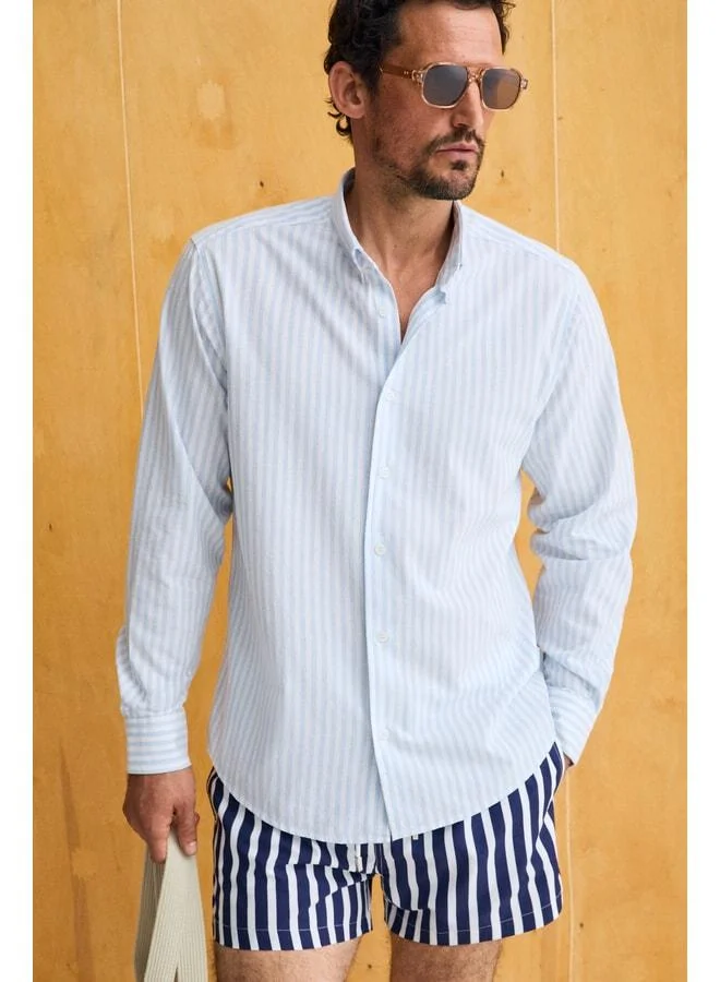 Grimelange RISTO Men's button-down shirt with collar and cuff, blue striped fabric that minimizes ironing needs after washing.