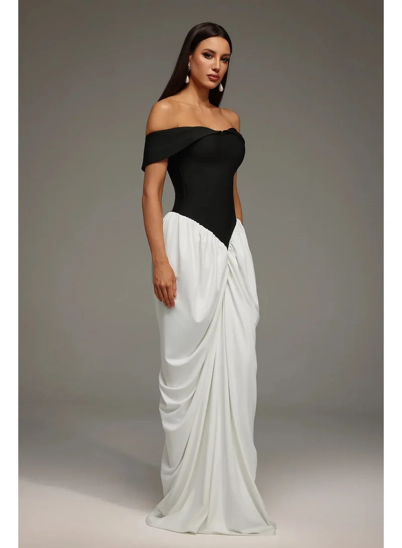 بيلا بارنيت فستان لينا ماكسي بدون أكمام مكشوف الكتفين مع تفاصيل مكشكشة.