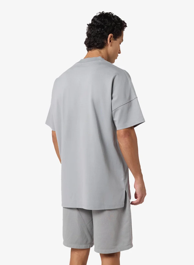 سكوات وولف تيشيرت قطن كبير بطبعة كلمة