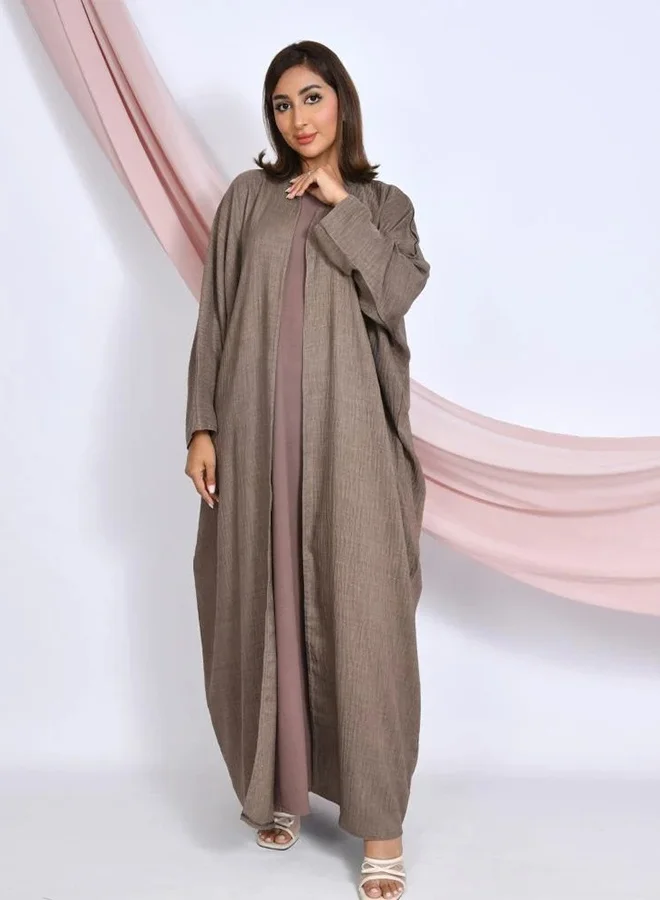 HAWRAA ABAYA Practical abaya with a quarter bisht design in nude color
