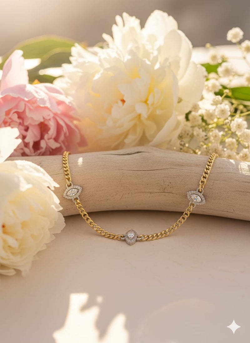 A necklace with a thick, gold-plated chain, punctuated by three oval, almond-shaped or eye-shaped units. A row of shiny rectangular stones - additional links for size adjustment. - Image 4