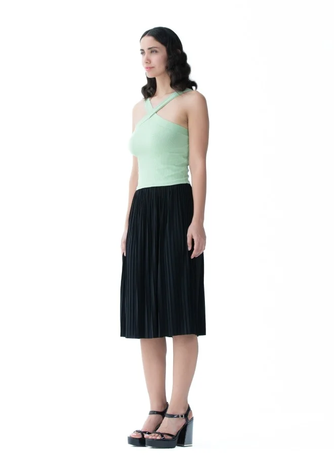 هايليز Fresh mint green crop top with a cross-back design for a cool and breezy look.