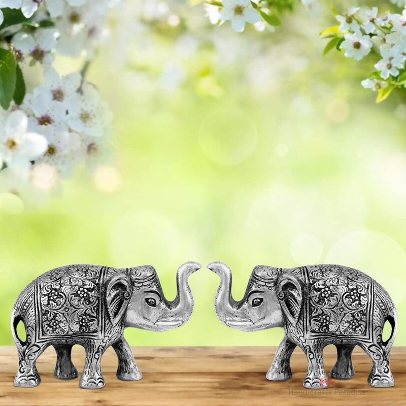 Handicrafts Paradise Handicrafts Paradise Metal Oxidised Carved Trunk Up Elephant Pair - Silver, 6 X 2 X 4 Inch - Image 1