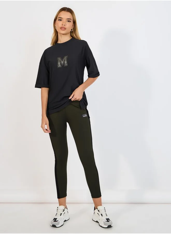 Styli Oversized T-Shirt with Chest Print & Fitted Leggings Co-Ords Set