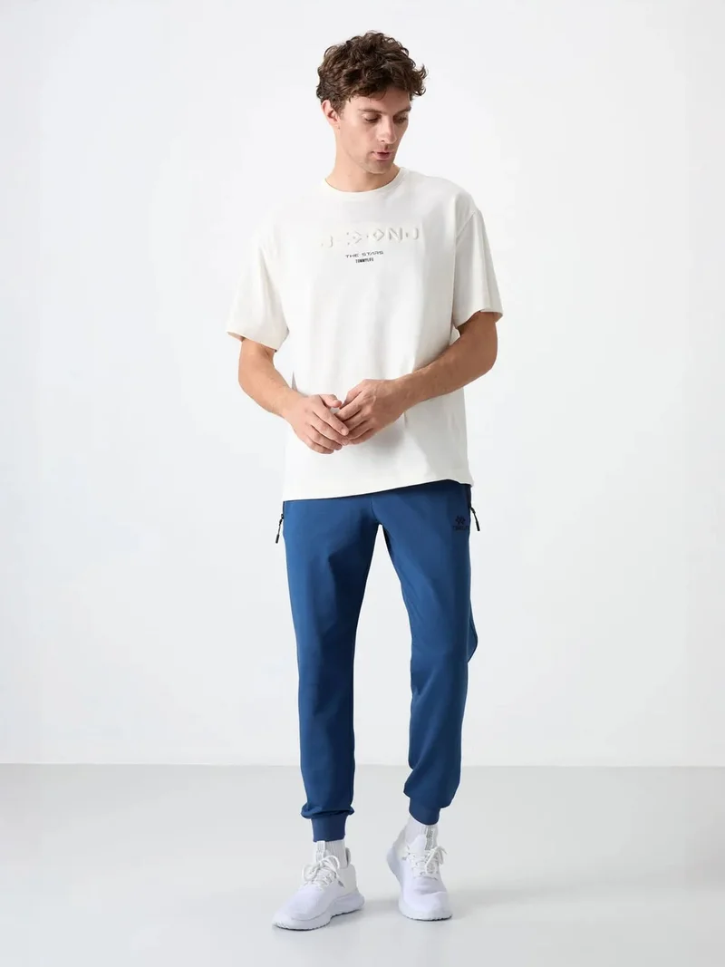 تومي لايف TOMMY Men's Solid Pull-on Sweatpants With Zip Pocket