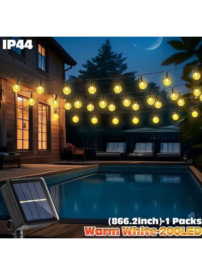 200 مصباح شمسي خارجي من الثنائيات الباعثة للضوء بسلسلة، مستشعر حركة، 8 أوضاع، أبيض دافئ للحديقة - Image 1