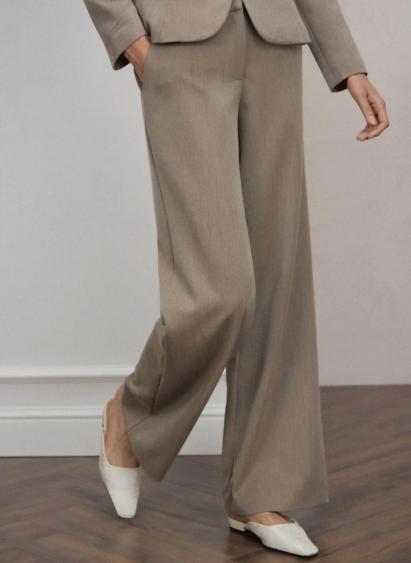 Lichi  Loose-fitting trousers with metal clasps for Women | Best Price UAE