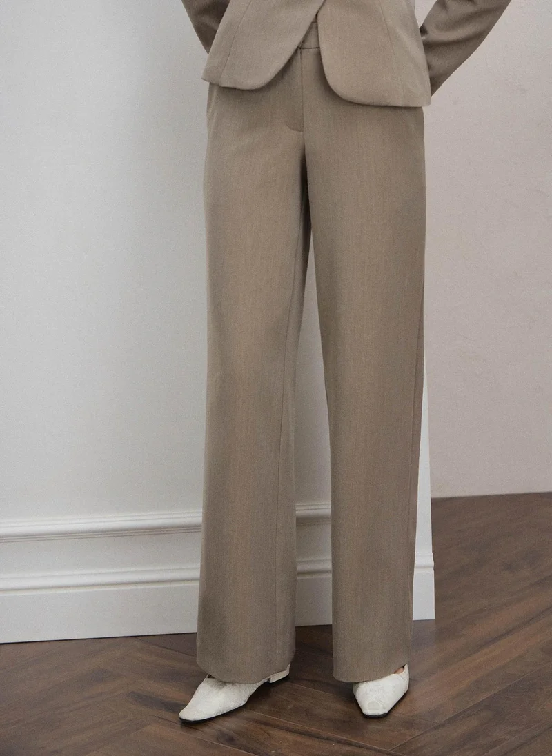 Lichi  Loose-fitting trousers with metal clasps for Women | Best Price UAE