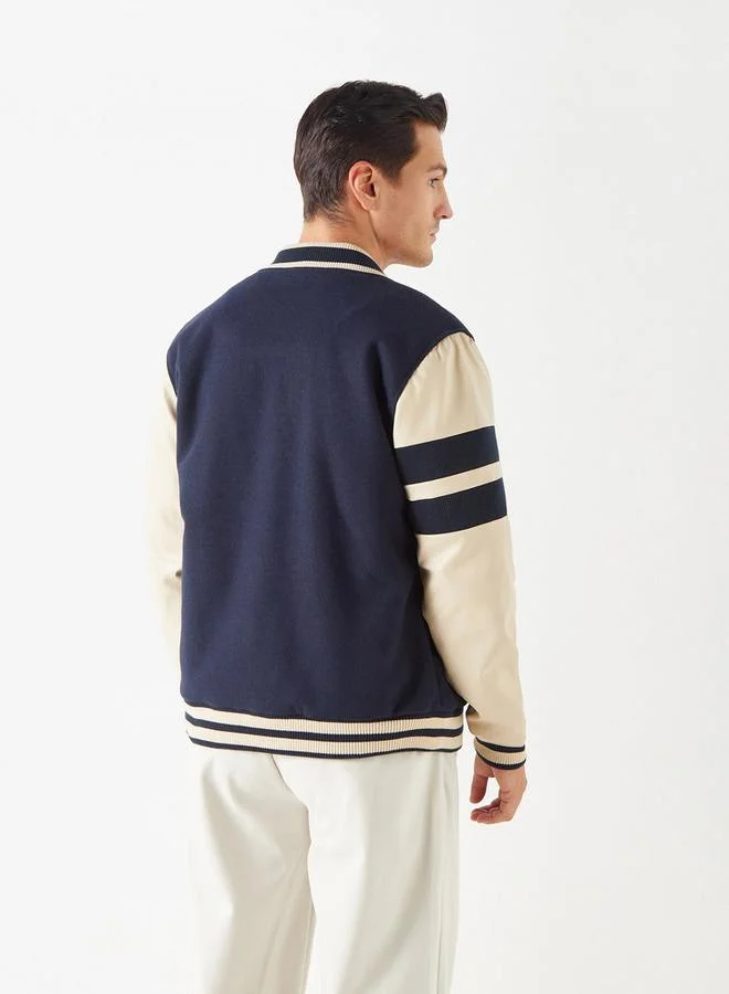 ايكونيك جاكيت فارسيتي بطبعات وأزرار إغلاق كبس من أيكونيك