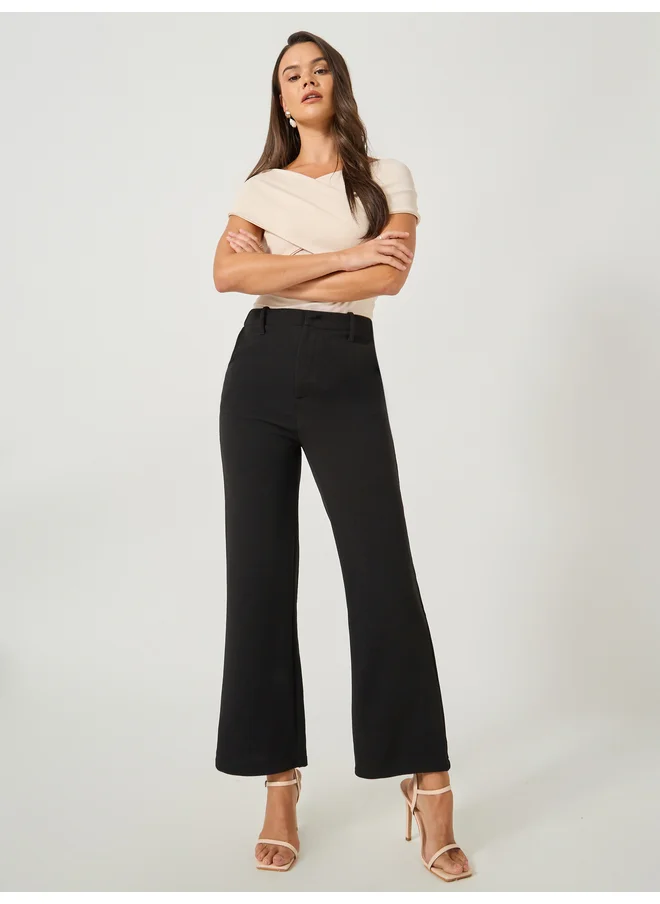 Styli Styli Solid Flat Front Low Rise Flared Pants