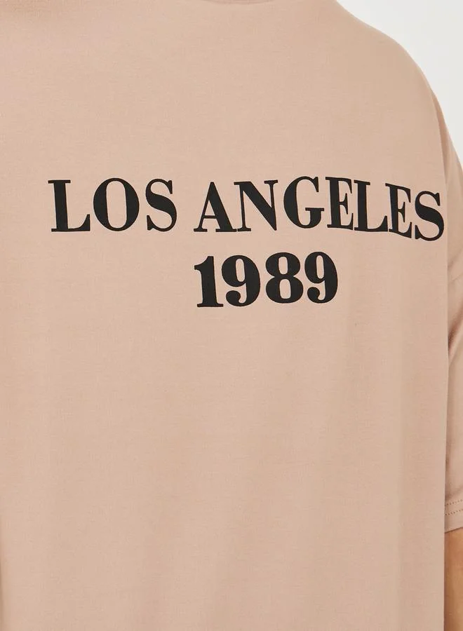 Styli Back Slogan Print Oversized T-Shirt & Flared Joggers Co-Ords