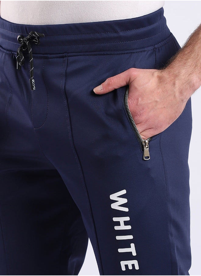 WHITE RABBIT - Thigh To Knee Printed "Whte Rabbit" Sweatpants - Navy Blue - Image 1