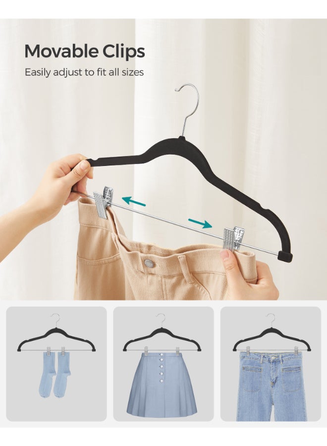SONGMICS Trouser Hangers, Set of 20 Velvet Hangers with Adjustable Clips, 42.5 cm Long, Non-Slip, Space-Saving, for Skirts, Coats, Dresses, Black - Image 3
