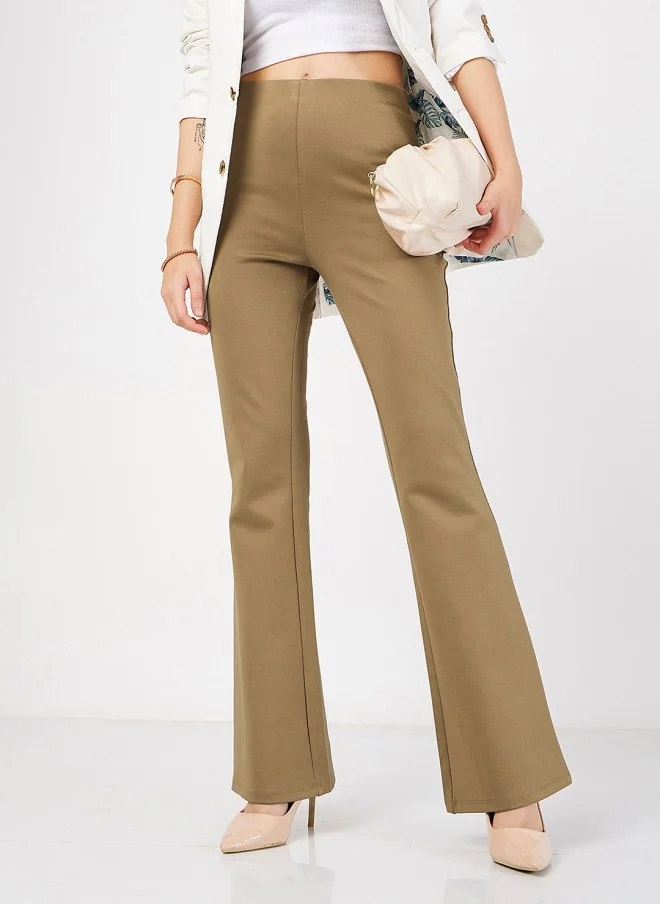 SASSAFRAS Beige Slim Fit Bootcut Trousers for Women