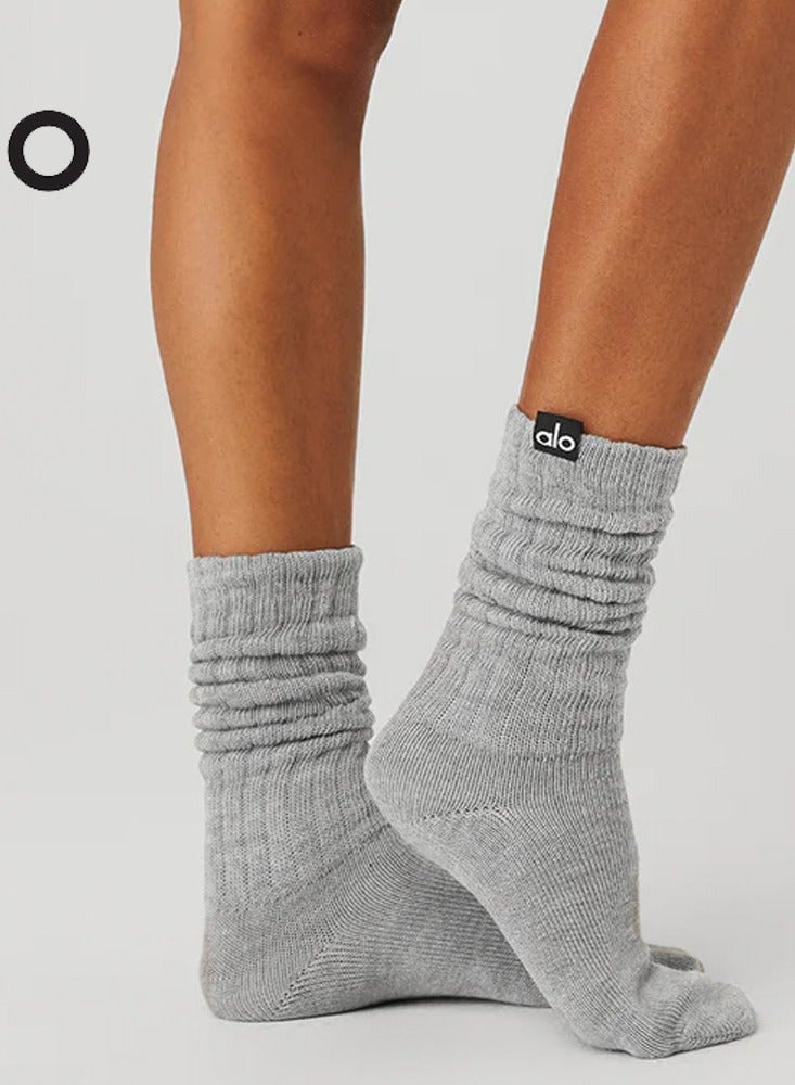 alo socks are soft, breathable, knitted and versatile for sports.  They are super thick and can be layered in one piece