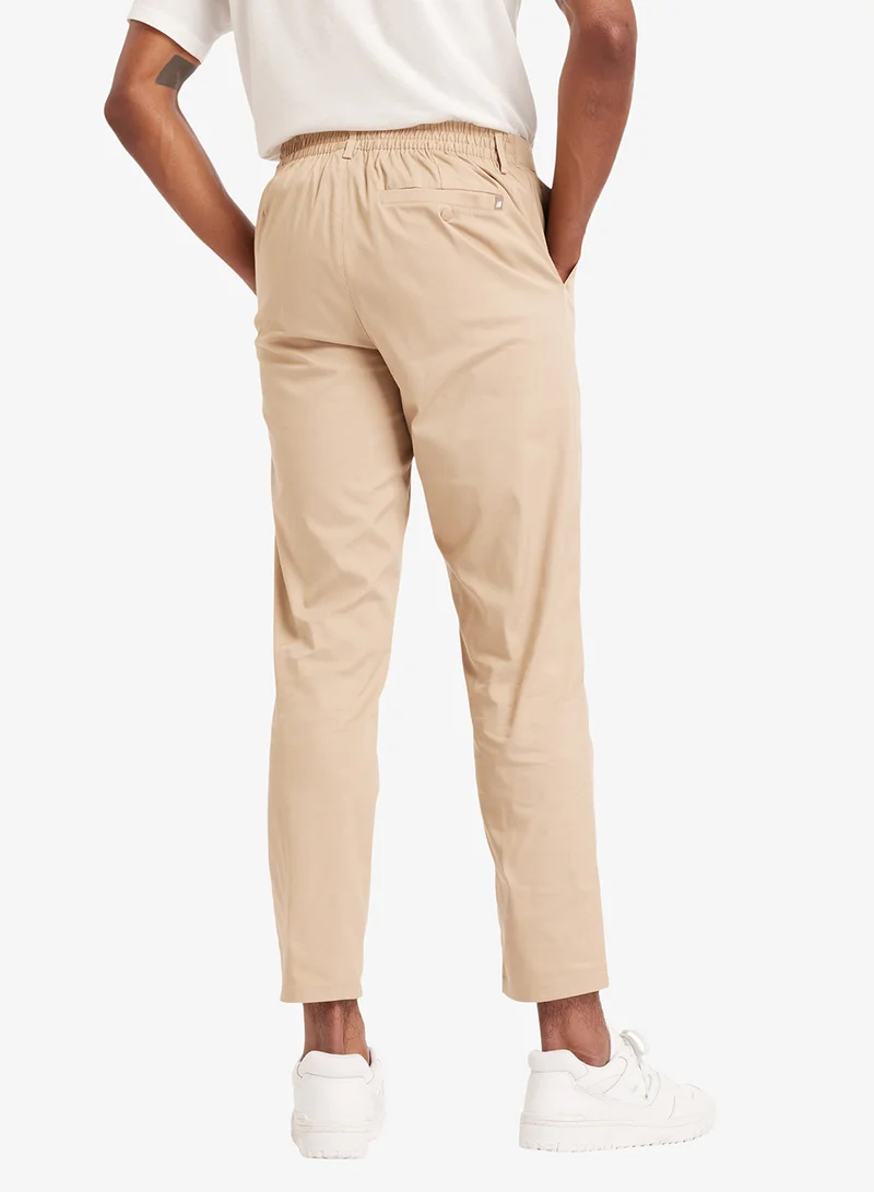 New Balance 30" Athletics Standard Tapered Pants
