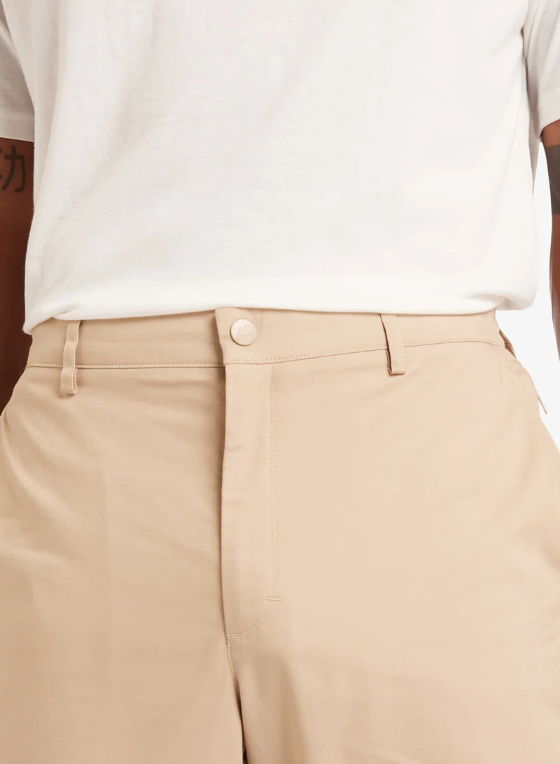 New Balance STONEWARE (SOT) 30" Athletics Standard Tapered Sweatpants for Men | Best Price UAE
