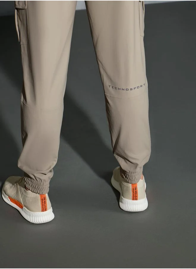 تكنوسبورت Technosport Solid Regular Fit Cargo Joggers with Drawstring