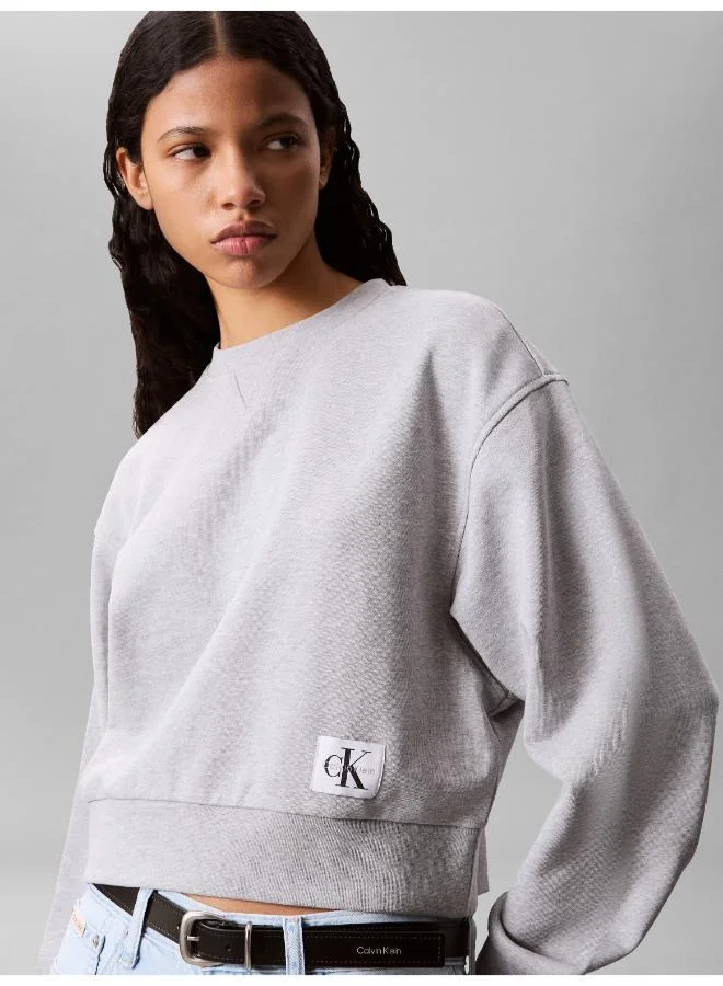 Calvin Klein Jeans BC06 Grey Heather Woven Label Crew Neck Sweatshirt for Women | Best Price UAE