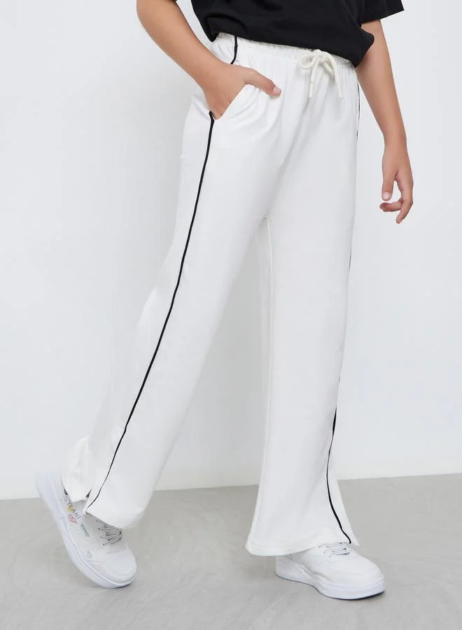 Styli Styli Teens Off White Wide Leg Joggers with Side Piping