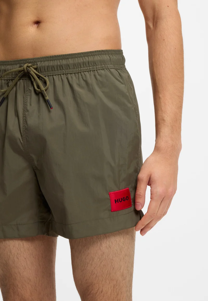 HUGO Dark Green Quick-dry swim shorts with logo label for Men | Best Price UAE