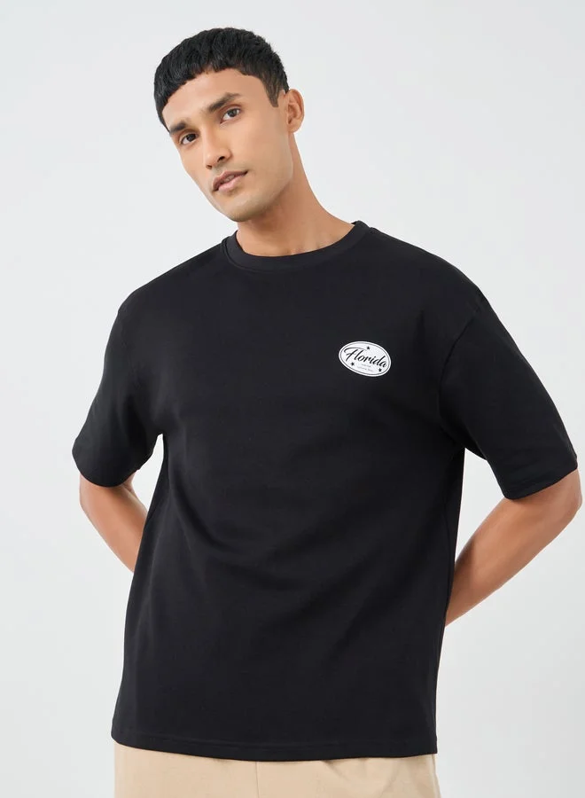 Styli Graphic Print Round Neck Oversized T-Shirt