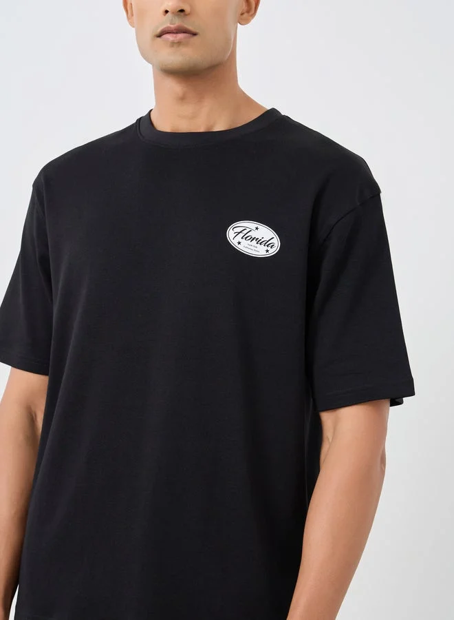 Styli Graphic Print Round Neck Oversized T-Shirt
