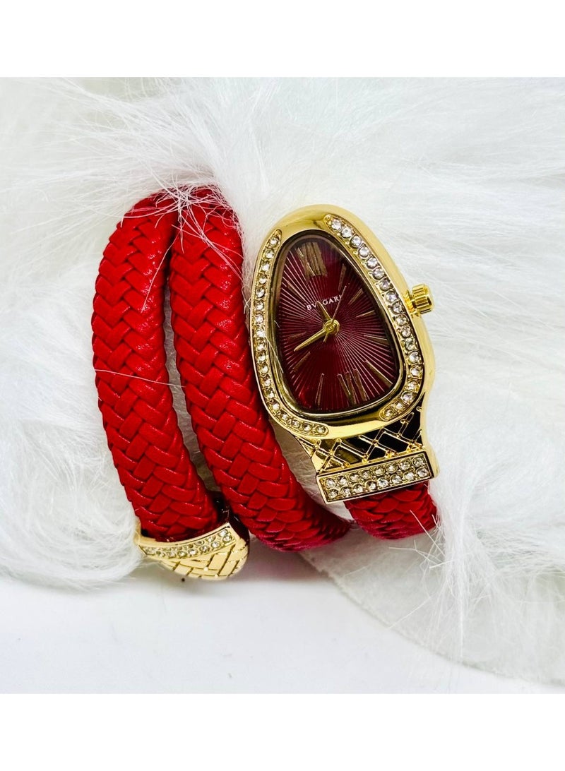 بولغاري ساعة نسائية جلد ثعبان بولغاري أحمر وذهبي