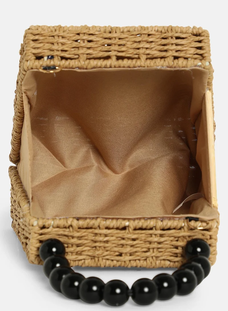 Haute Sauce Colour block Interlock Regular Cane Sling Bag For Women