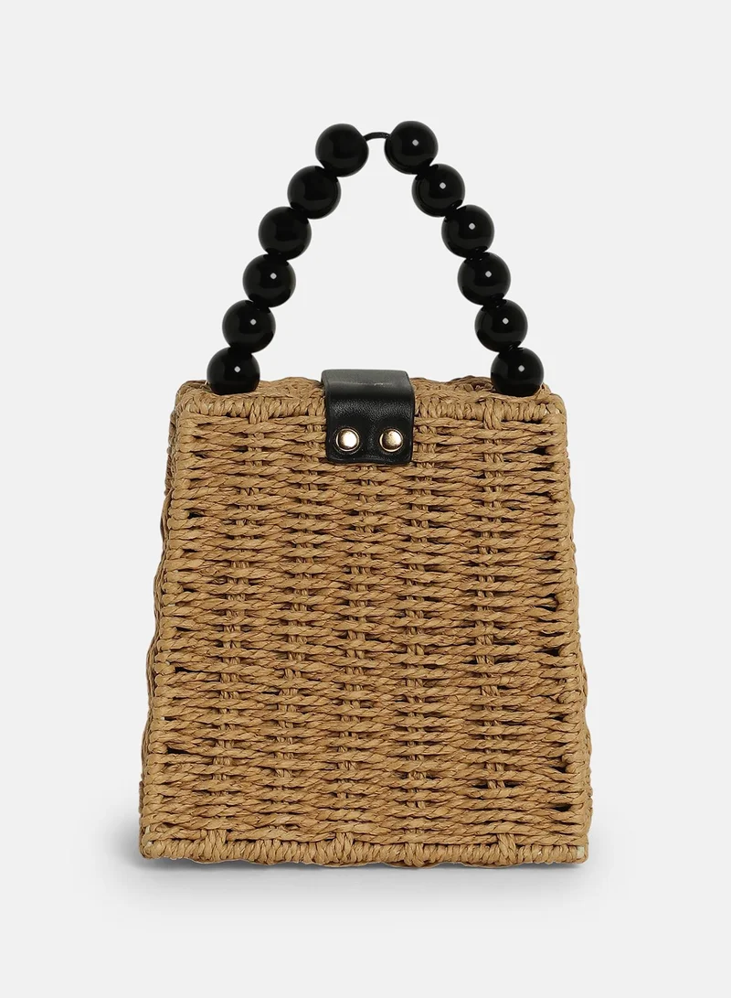 Haute Sauce Colour block Interlock Regular Cane Sling Bag For Women