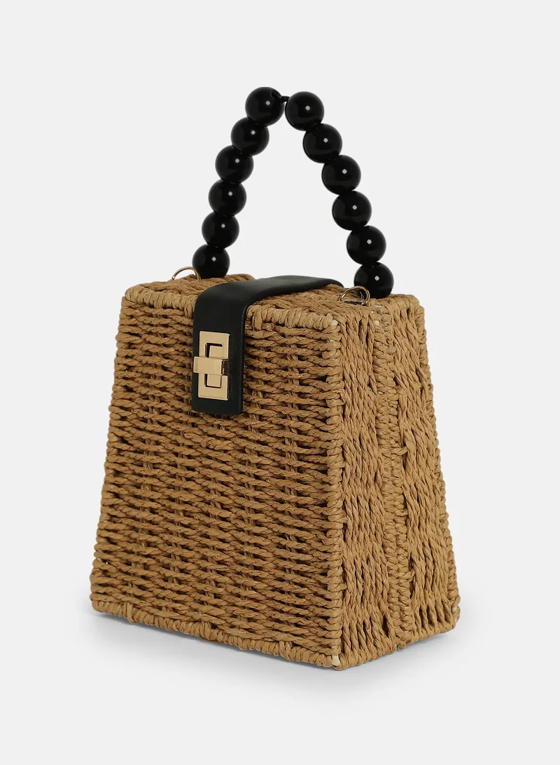 Haute Sauce Colour block Interlock Regular Cane Sling Bag For Women