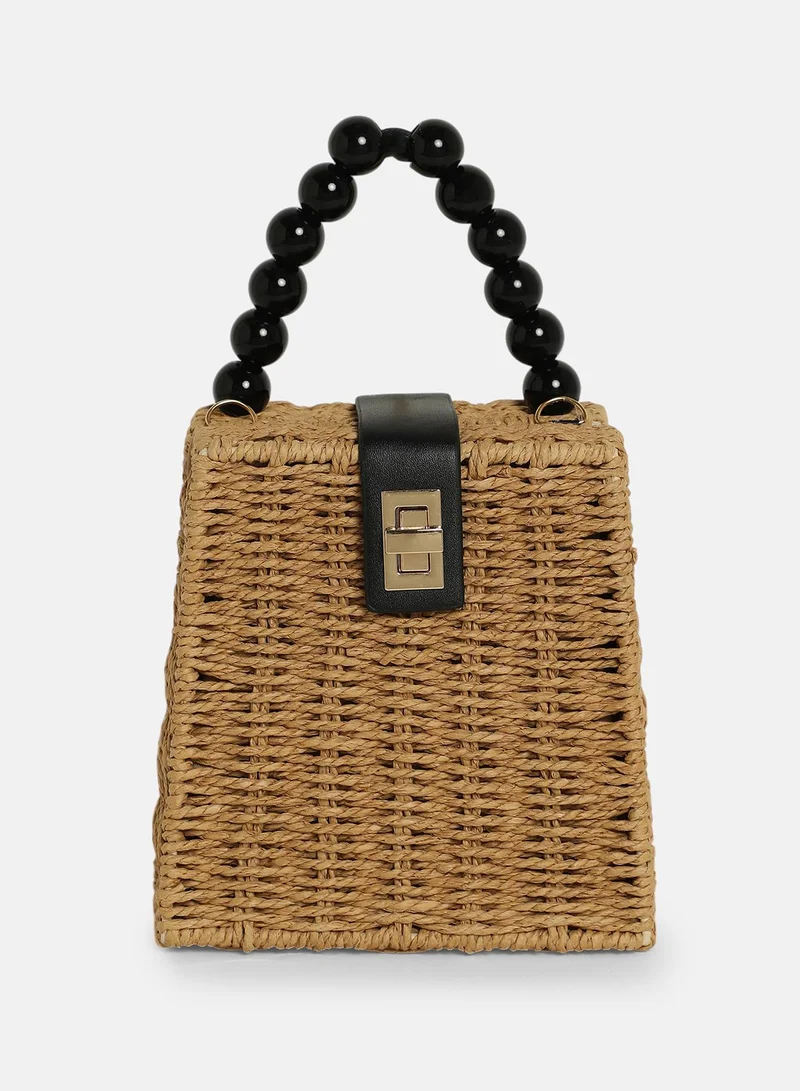 Haute Sauce Colour block Interlock Regular Cane Sling Bag For Women