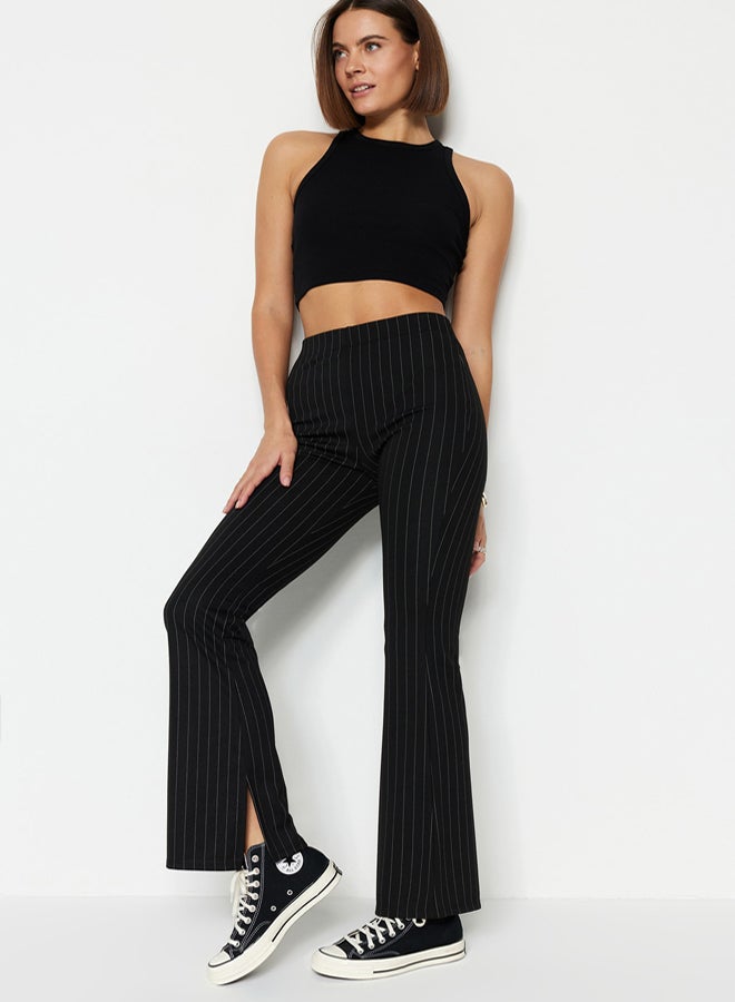 trendyol Black Smart Slit Flare/Spanish Leg High Waist Striped Knitted Leggings Trousers - Image 1