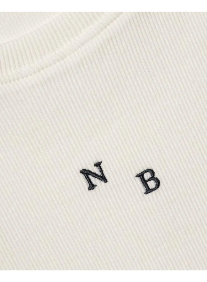 نكبن بلوزة بدون أكمام مضلعة