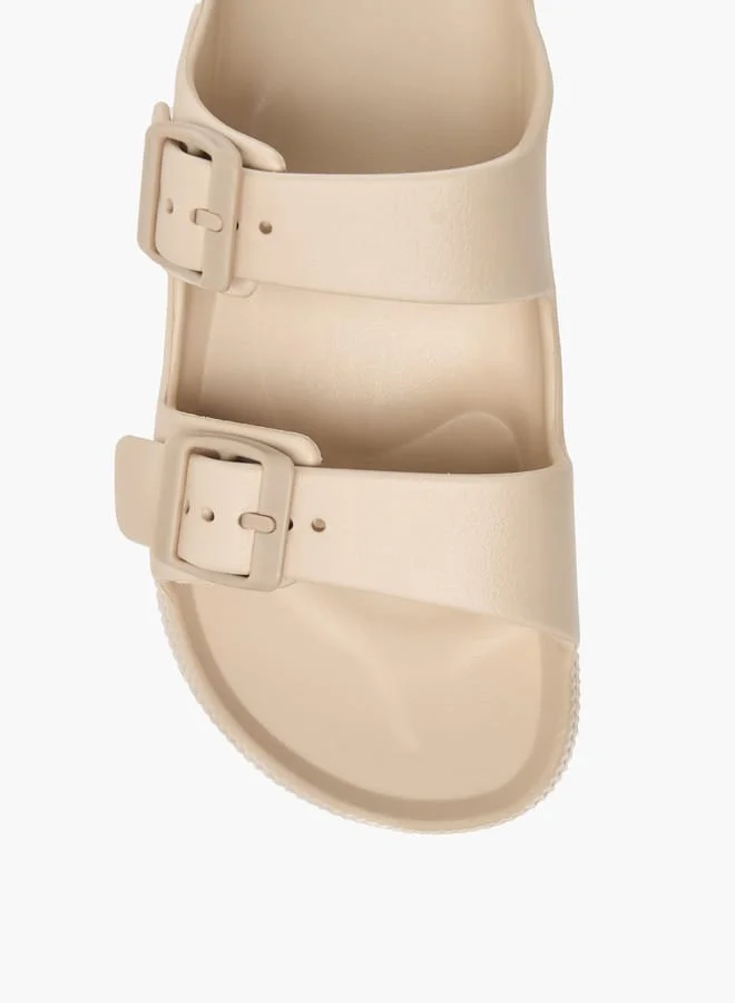 فلورا بيلا من شو إكسبرس Womens Solid Slip-On Sandals With Buckle Accent