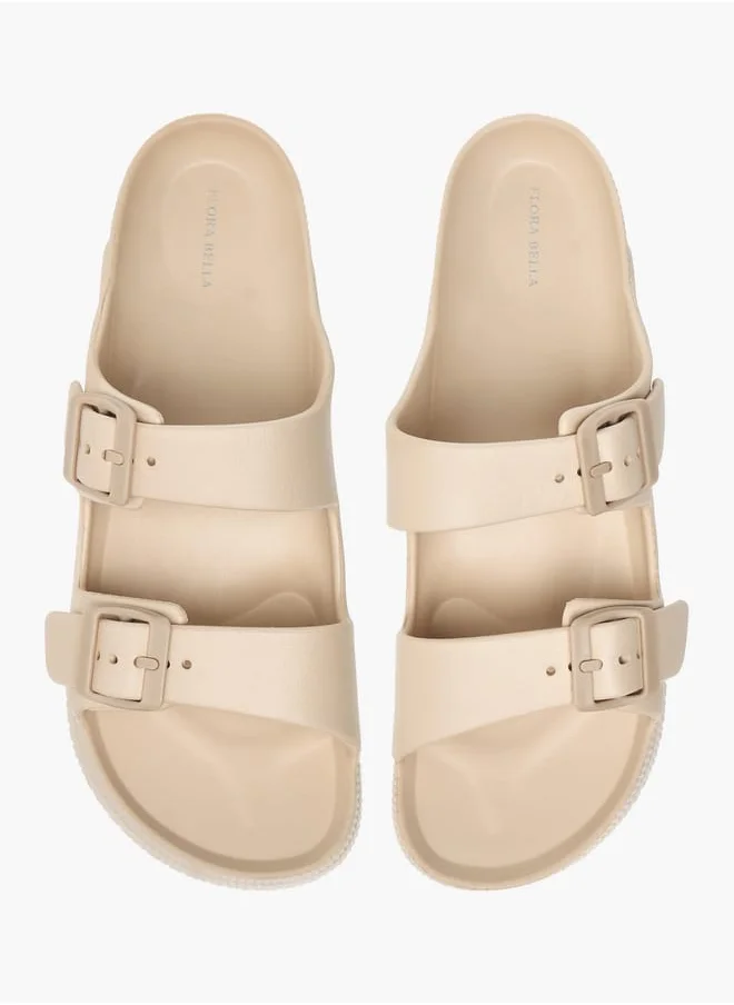 فلورا بيلا من شو إكسبرس Womens Solid Slip-On Sandals With Buckle Accent